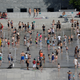People cool off in the fountains at the Andre Citroen park in Paris, France, on June 25.